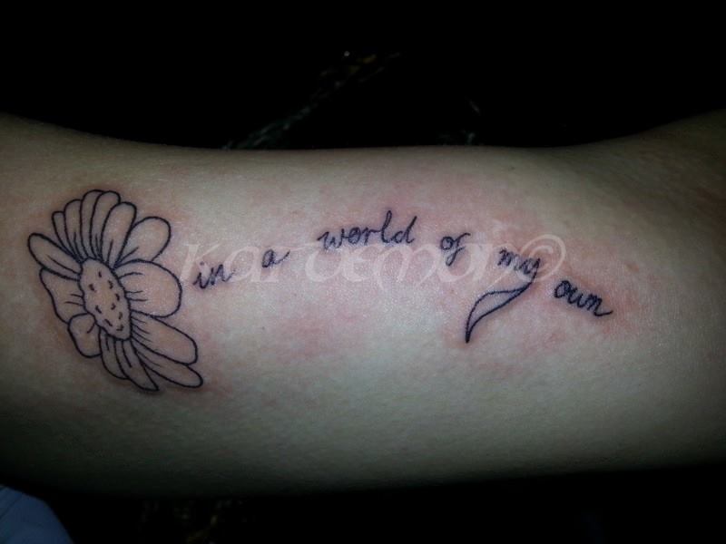 flower writing tattoo